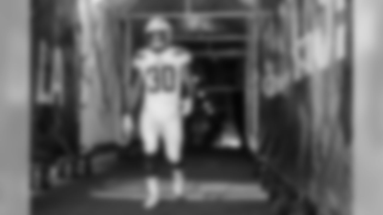 Austin Ekeler walks through the tunnel onto ROKiT Field at StubHub Center before the Bolts face the Kansas City Chiefs in the season opener.