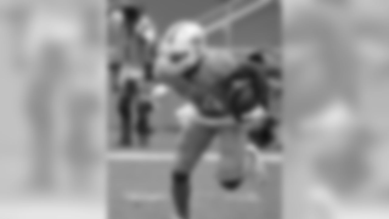 Miami Dolphins wide receiver Jarvis Landry (14) returns a kick against the New England Patriots Sunday, Jan. 3, 2016 at Miami Gardens, Fla. The Dolphins won 20 - 10 to end the NFL football regular season. (Al Messerschmidt via AP)