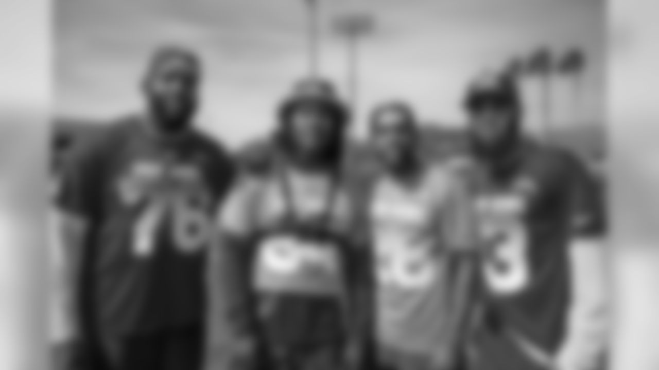 Russell Okung, Melvin Ingram, Casey Hayward and Keenan Allen pose for a photo at an AFC practice during Pro Bowl Week in Orlando.