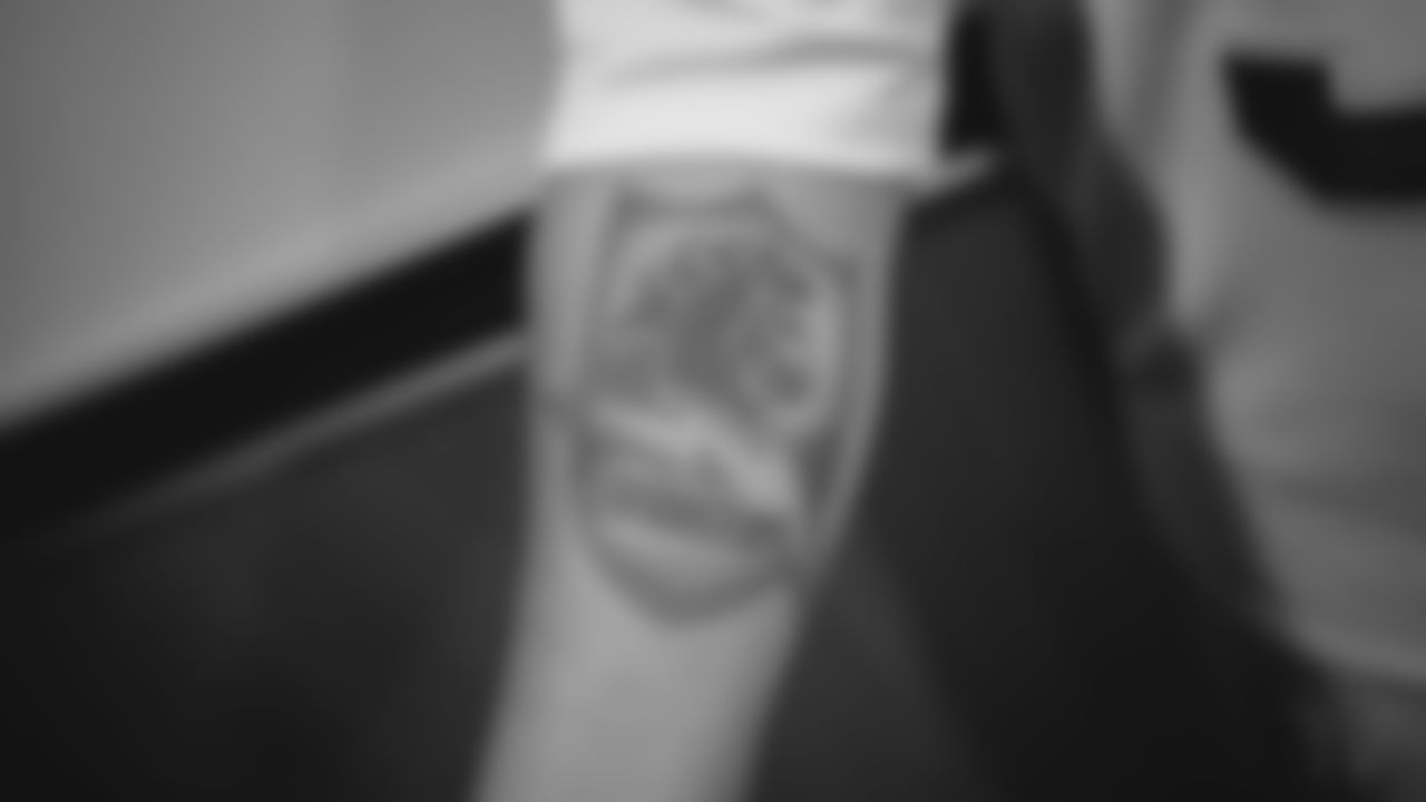 A fan shows off his Chargers tattoo during the Chargers Fan Cruise to Ensenada, Mexico.