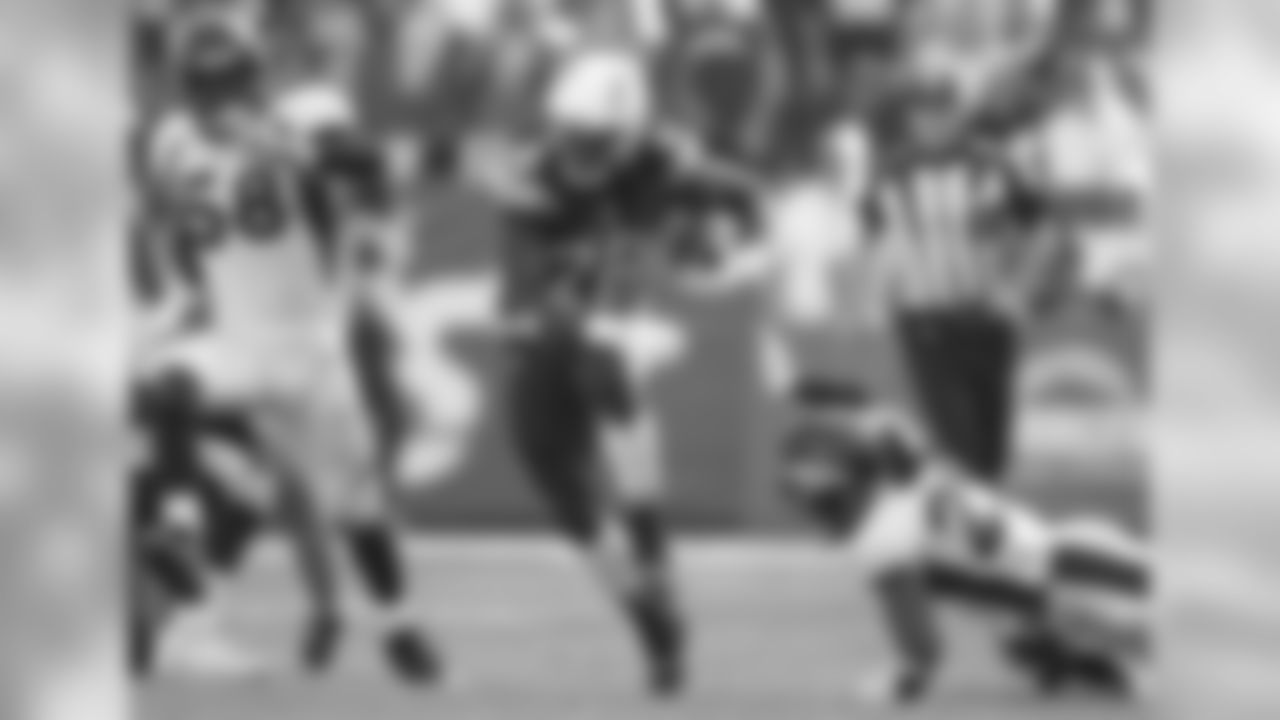 Melvin Gordon runs with the ball during Week 11's Salute to Service game versus the Denver Broncos on Sunday, November 18, 2018 at StubHub Center.