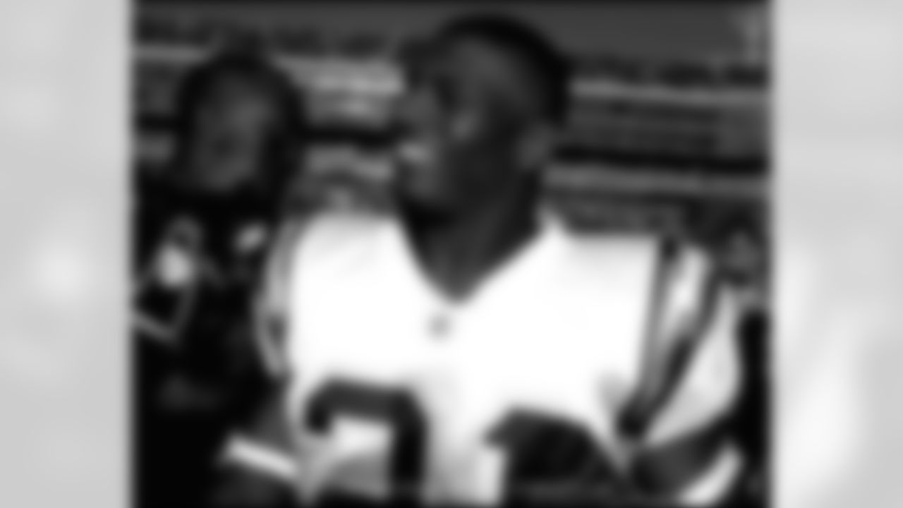 San Diego Chargers running back LaDainian Tomlinson walks off the field after 27-14 victory over the Oakland Raiders at McAfee Coliseum in Oakland, Calif. on Sunday, October 16, 2005. Tomlinson, who rushed for 140 yards in 31 carries, extended his touchdown scoring streak to 18 games. He also scored a touchdown rushing, receiving and threw a touchdown in the first half. (Kirby Lee)