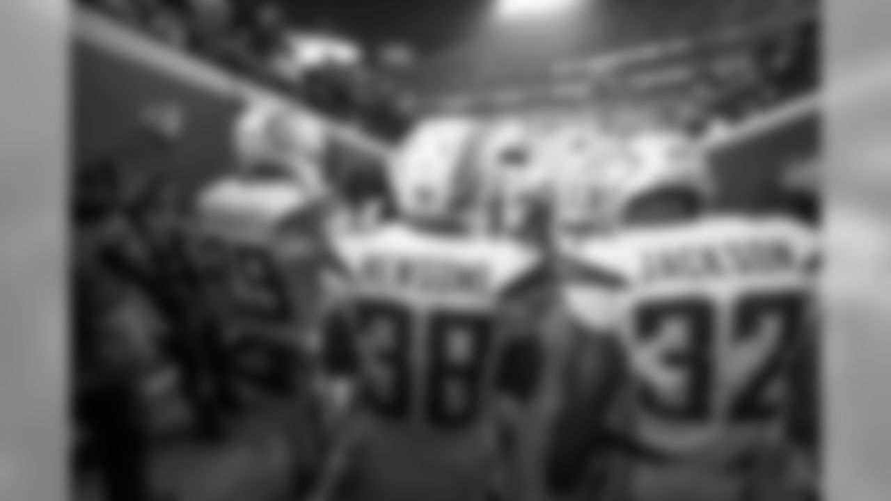 Jeff Richards, Detrez Newsome and Justin Jackson walk out to the field to warm up at Arrowhead Stadium before the Thursday night matchup against the Kansas City Chiefs.