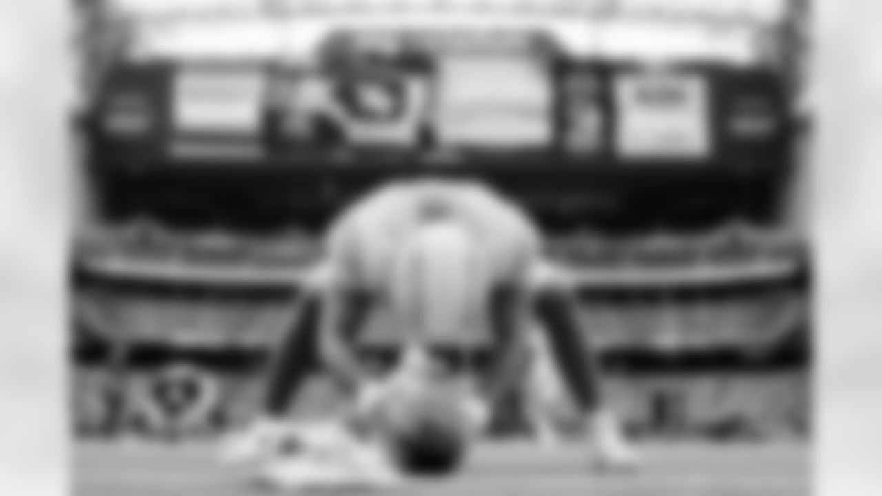 The Los Angeles Chargers prepare to play against the Houston Texans at NRG Stadium on October 2, 2022 in Houston, Texas.
