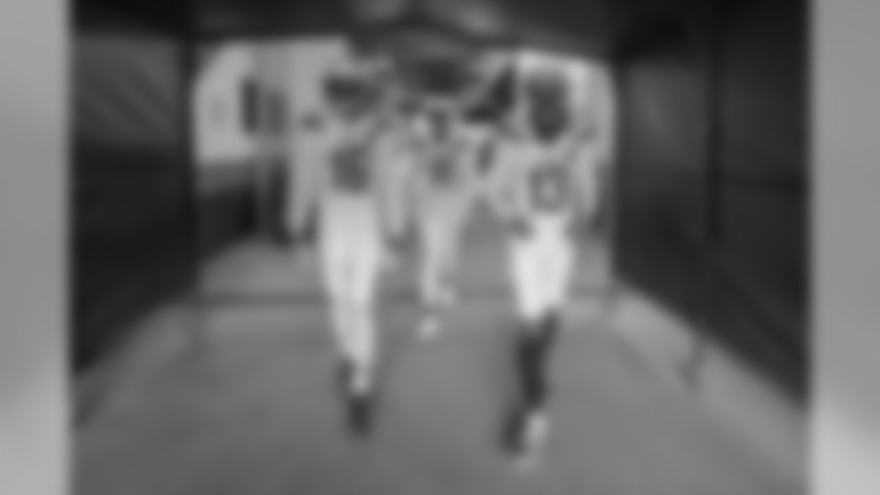Tyrell Williams, Geremy Davis and Keenan Allen walk out to warm up before the Week 17 contest against the Denver Broncos.