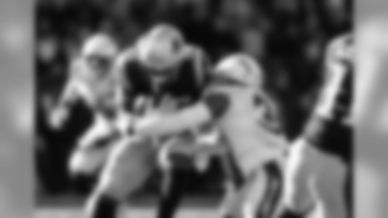 Adrian Phillips tackles RB Sony Michel during the Divisional Round matchup against the New England Patriots at Gillette Stadium.