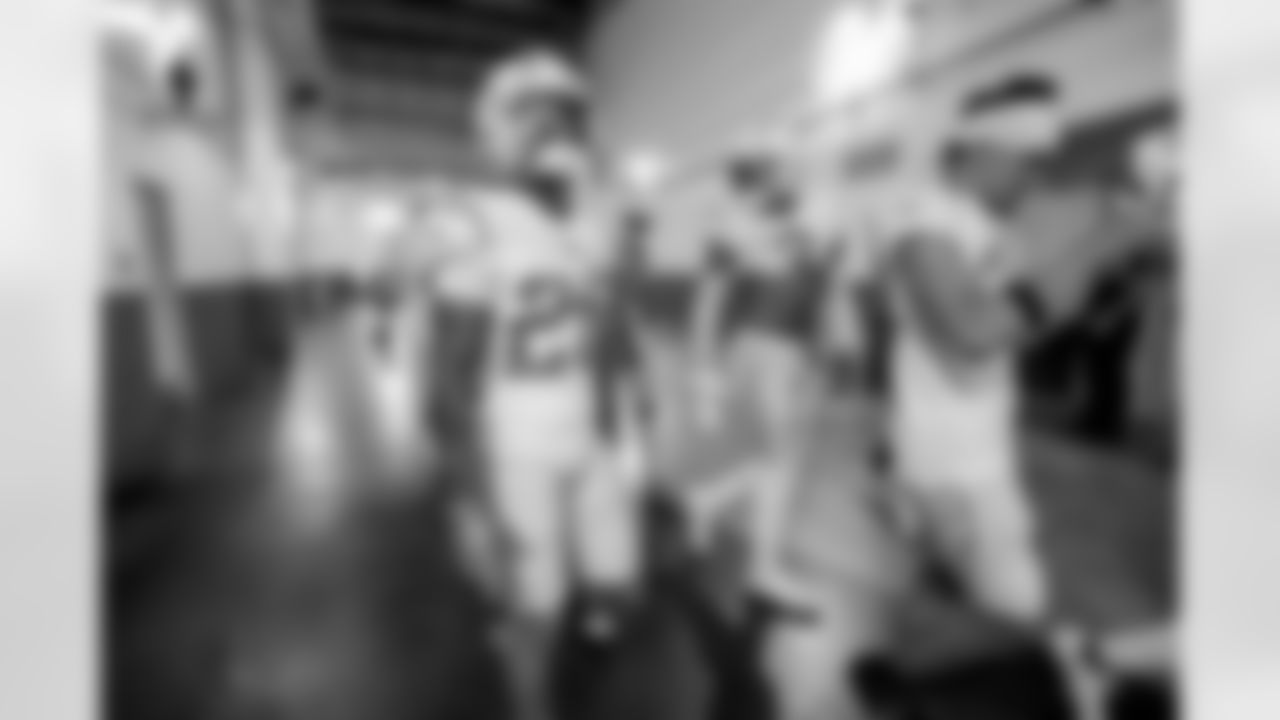 The Los Angeles Chargers prepare to play against the Arizona Cardinals at State Farm Stadium on November 27, 2022 in Glendale, Arizona.