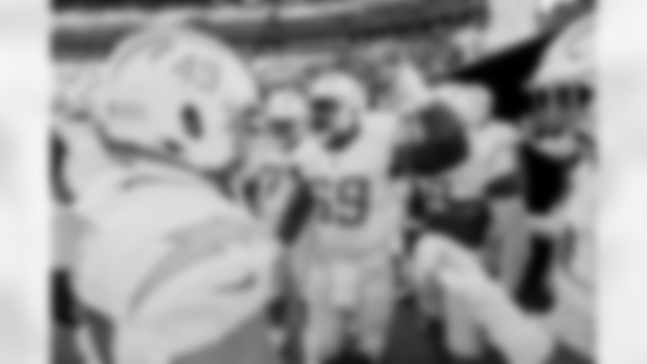 The Los Angeles Chargers prepare to play against the Denver Broncos at Empower Field at Mile High on January 8, 2023 in Denver, Colorado.
