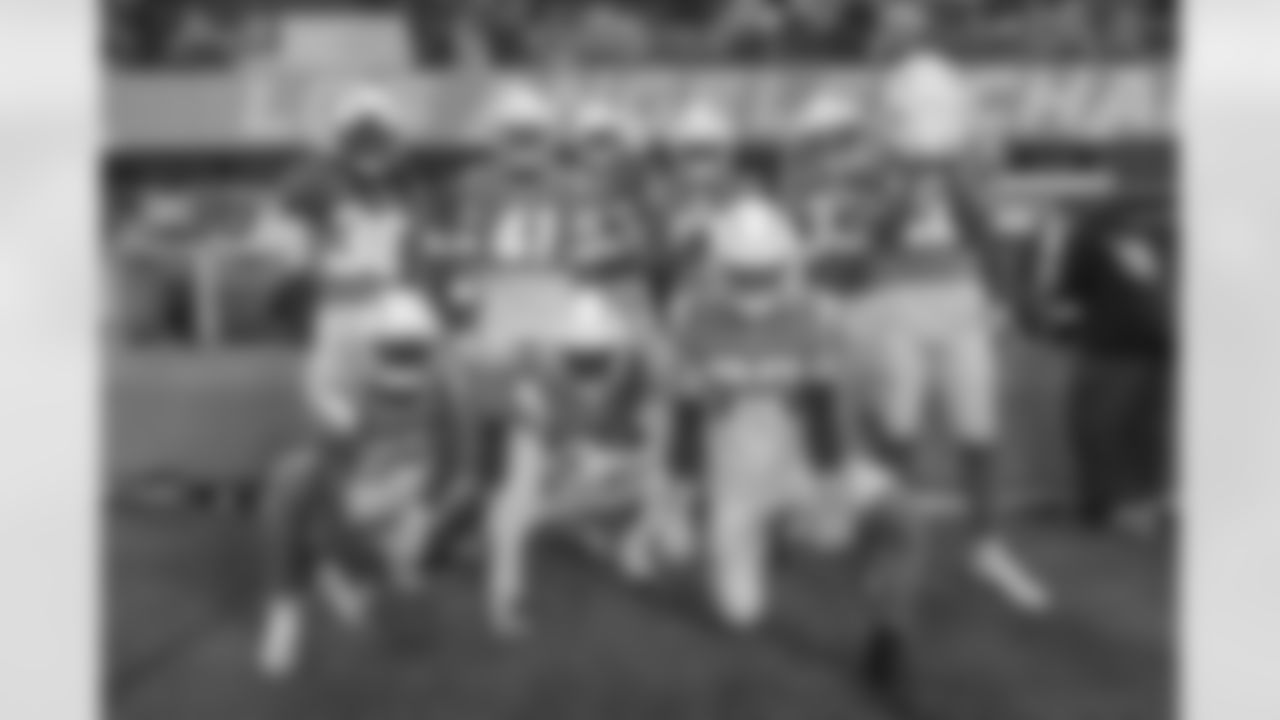 The Los Angeles Chargers prepare to play against the Miami Dolphins at SoFi Stadium on December 11, 2022 in Inglewood, California.