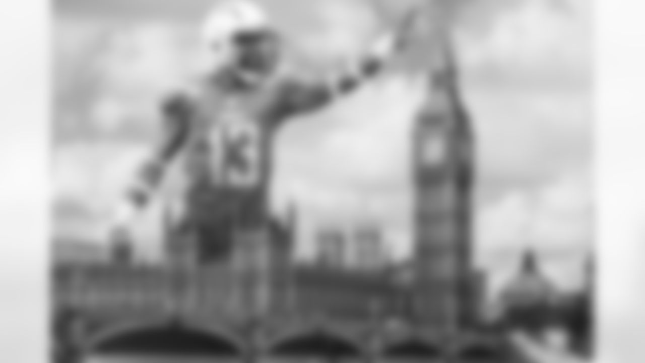 Keenan Allen touching the top of Big Ben.