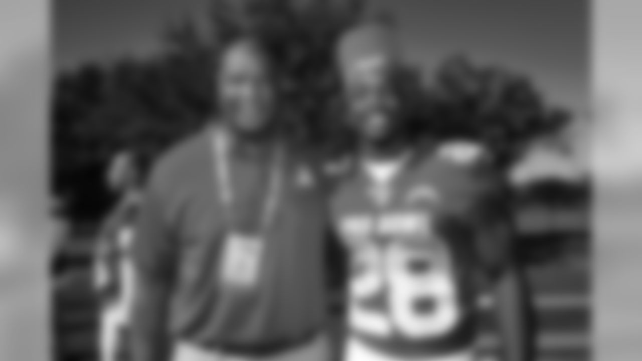 RB coach Alfredo Roberts and Melvin Gordon pose for a photo ahead of Pro Bowl practice on Friday, Jan. 25, 2019 in Orlando, FL.