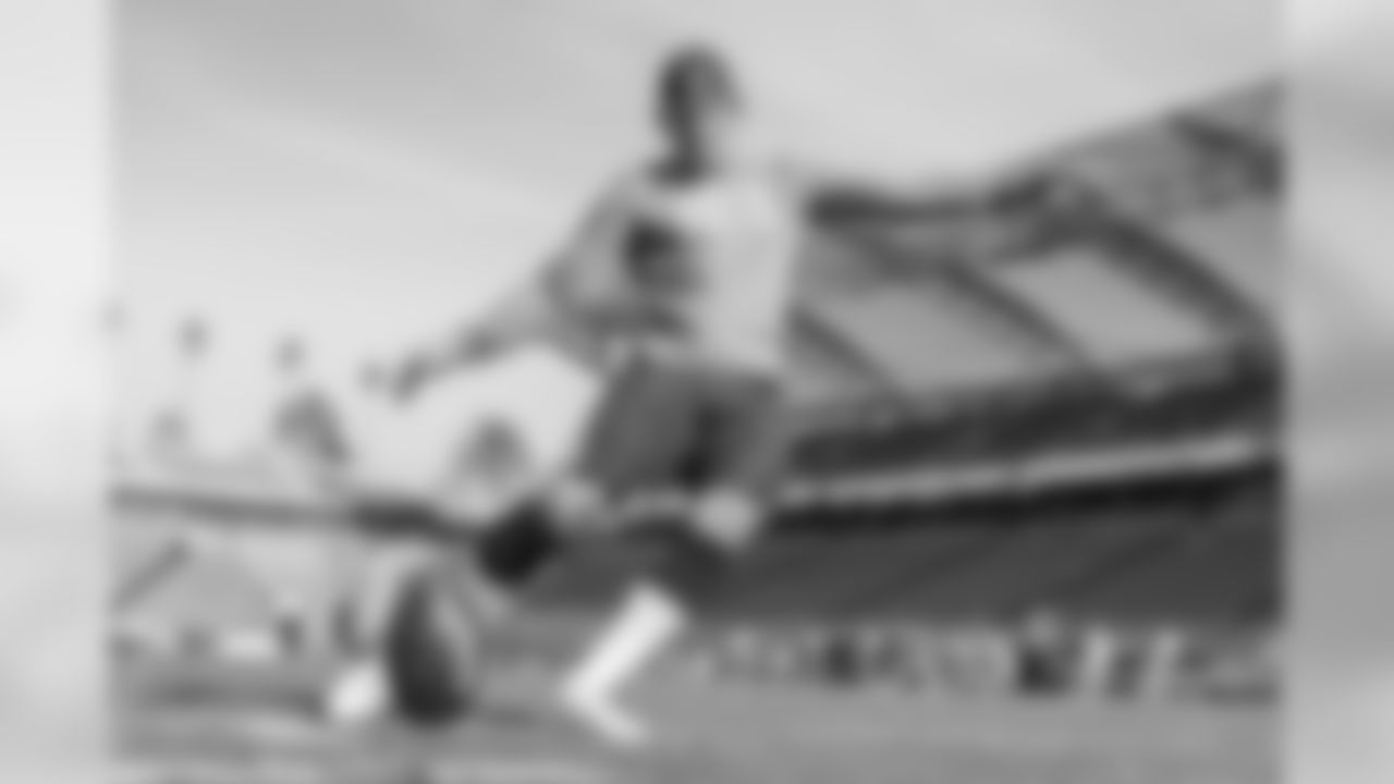 Michael Badgley warms up before the Week 14 matchup against the Cincinnati Bengals at ROKiT Field at StubHub Center.