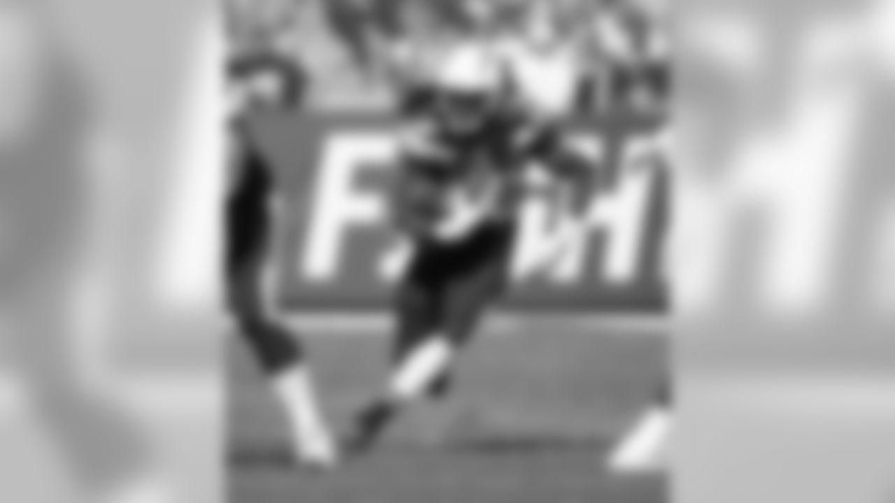 Melvin Gordon runs with the ball during Week 11's Salute to Service game versus the Denver Broncos on Sunday, November 18, 2018 at StubHub Center.