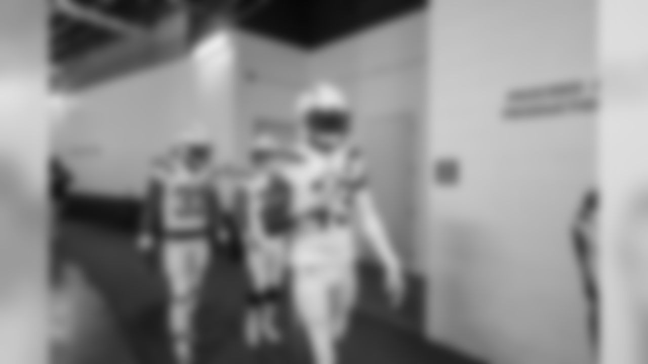 Michael Davis walks out to the field to warm up before the Week 17 contest against the Denver Broncos.