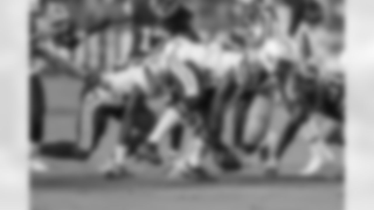 Tony Brown recovers the ball after a forced fumble by Chris Landrum against the San Francisco 49ers during the last preseason game.