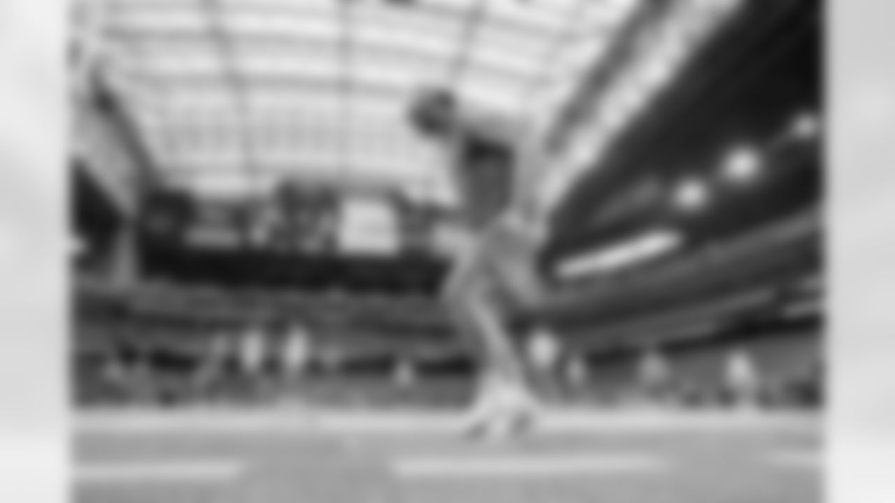 The Los Angeles Chargers prepare to play against the Houston Texans at NRG Stadium on October 2, 2022 in Houston, Texas.