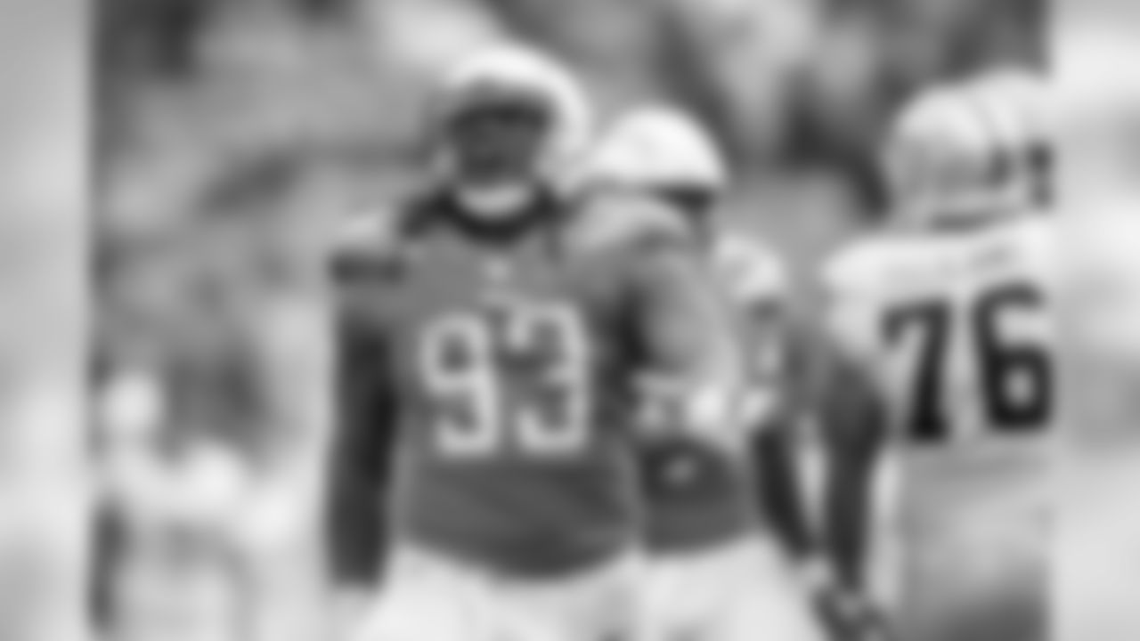 Darius Philon celebrates his sack during the Week 5 matchup against the Oakland Raiders at ROKiT Field at StubHub Center.