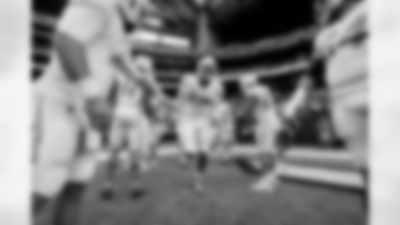 The Los Angeles Chargers prepare to play against the Houston Texans at NRG Stadium on October 2, 2022 in Houston, Texas.
