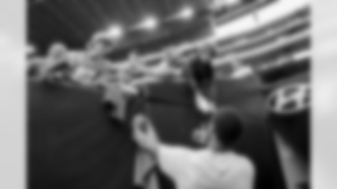 The Los Angeles Chargers prepare to play against the Houston Texans at NRG Stadium on October 2, 2022 in Houston, Texas.