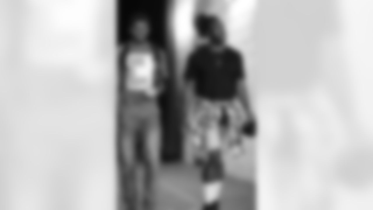 Tyrell Williams and Geremy Davis arrive at ROKiT Field at StubHub Center before the Week 14 matchup against the Cincinnati Bengals.