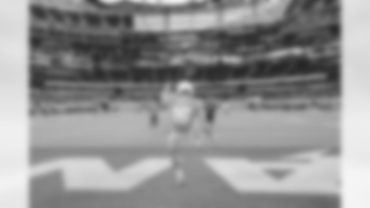 The Los Angeles Chargers prepare to play against the Miami Dolphins at SoFi Stadium on December 11, 2022 in Inglewood, California.