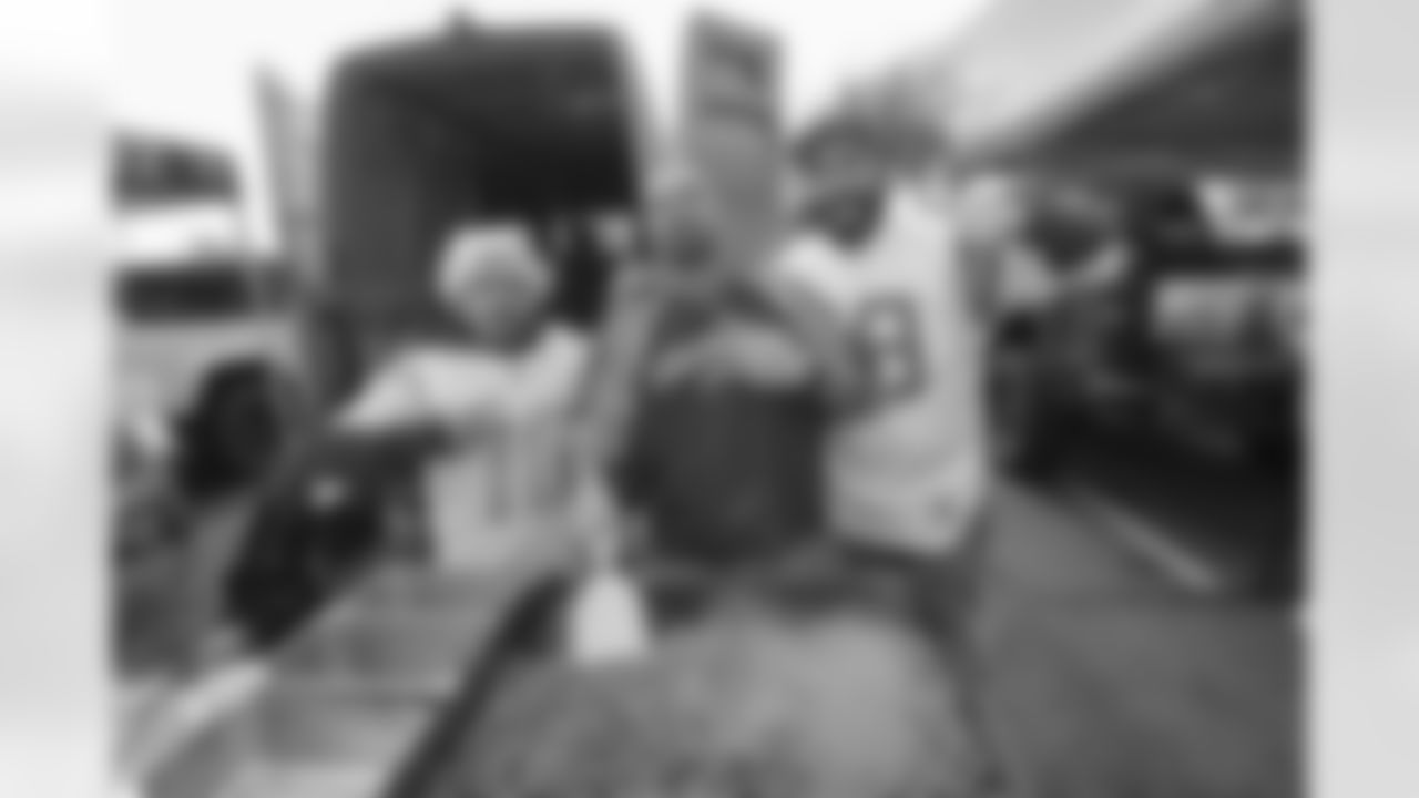 Bolt Fam show up at SoFi Stadium to root against the Miami Dolphins on December 11, 2022 in Inglewood, California.