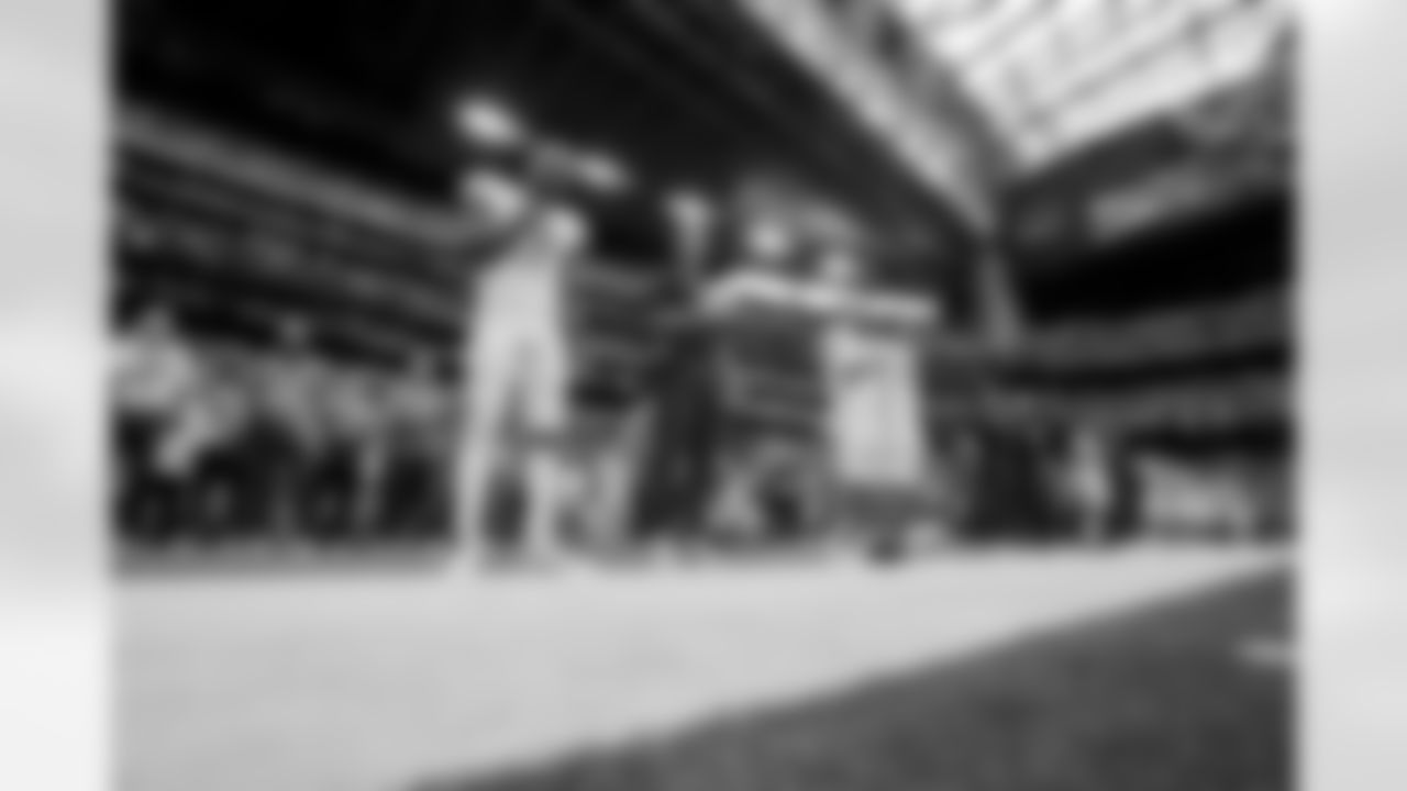 The Los Angeles Chargers prepare to play against the Houston Texans at NRG Stadium on October 2, 2022 in Houston, Texas.