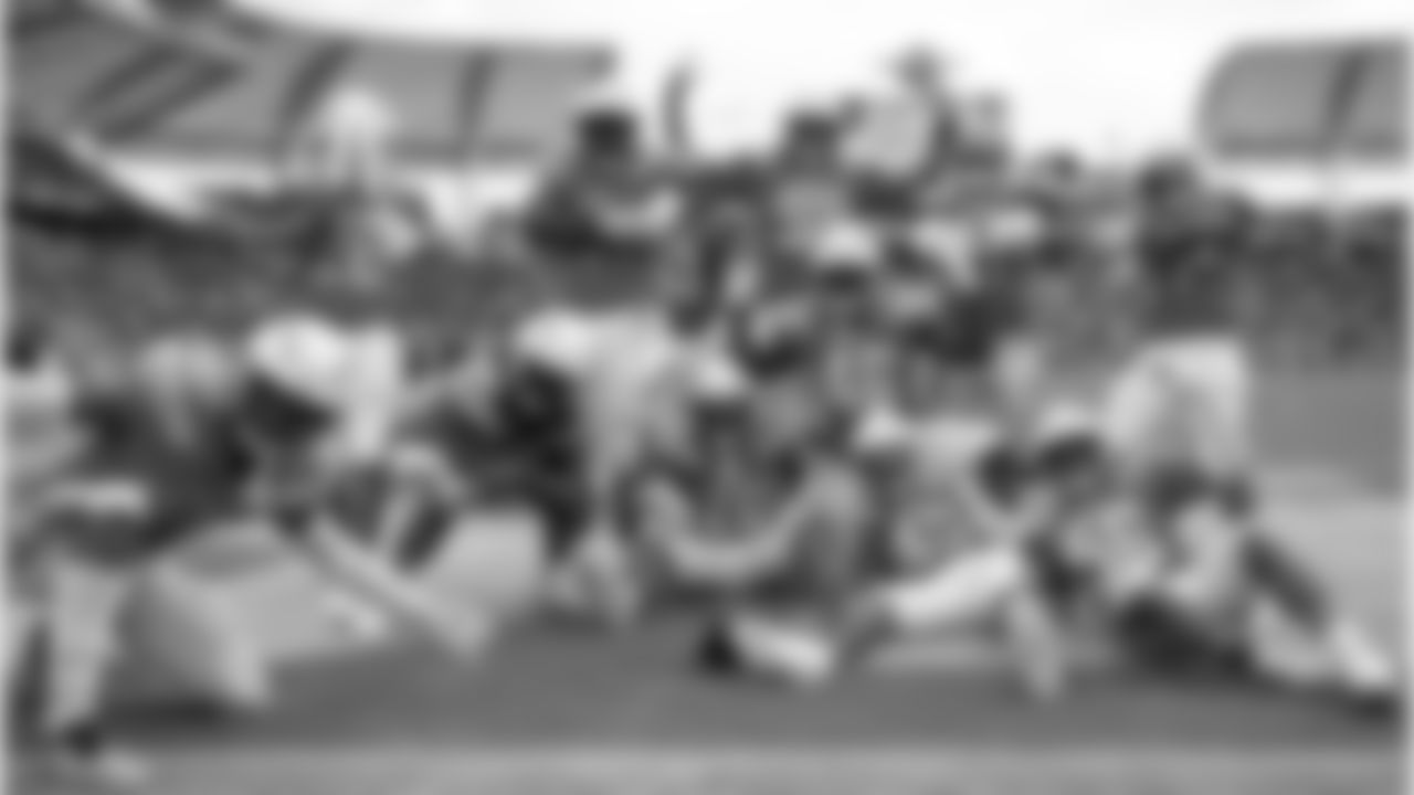 The Bolts pose for a picture after Melvin Ingram intercepted Derek Carr in the end zone during the Week 5 matchup against the Oakland Raiders at ROKiT Field at StubHub Center.