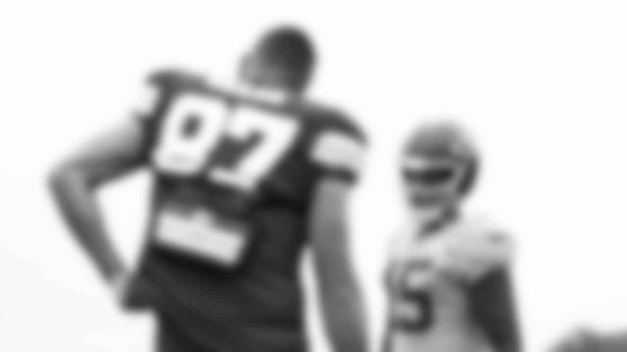 Kansas City Chiefs quarterback Patrick Mahomes (15) talks to tight end Travis Kelce (87) during warmups at Kansas City Chiefs Training Camp in St. Joseph, MO on Tuesday, August 8, 2023.