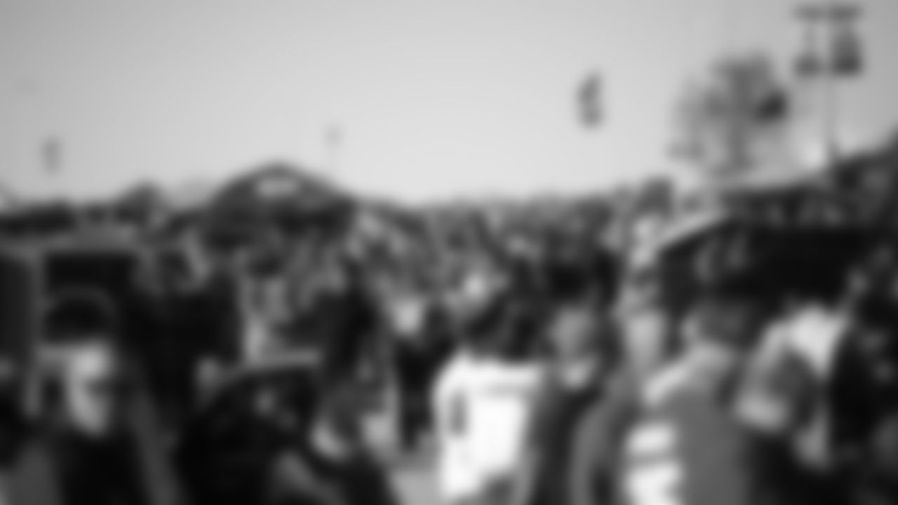 Fan arrive to the stadium prior to an NFL football game against the Dallas Cowboys, Sunday, November 21, 2021 in Kansas City.