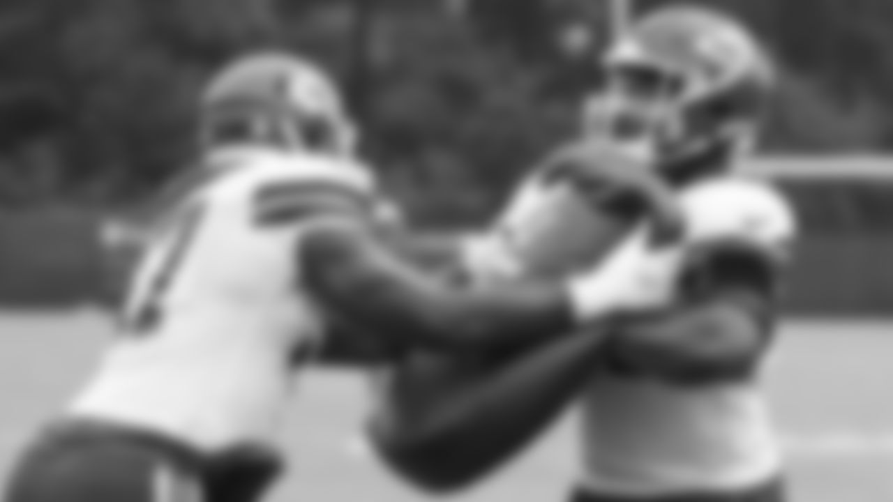 Kansas City Chiefs defensive end Alex Okafor (97) and defensive end Michael Danna (51) during practice at The University of Kansas Health System Training Complex.