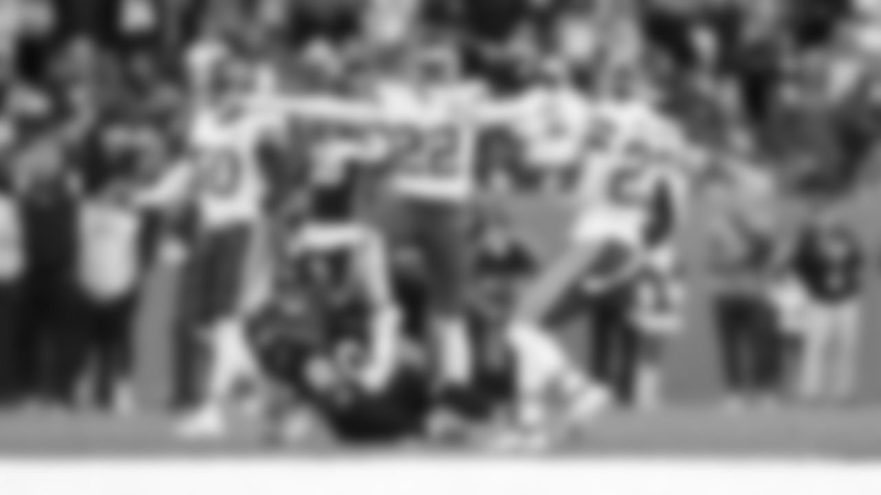 Kansas City Chiefs defensive back Juan Thornhill (22) celebrates a tackle during an NFL football game against the Denver Broncos, Sunday, December 11, 2022 in Denver.