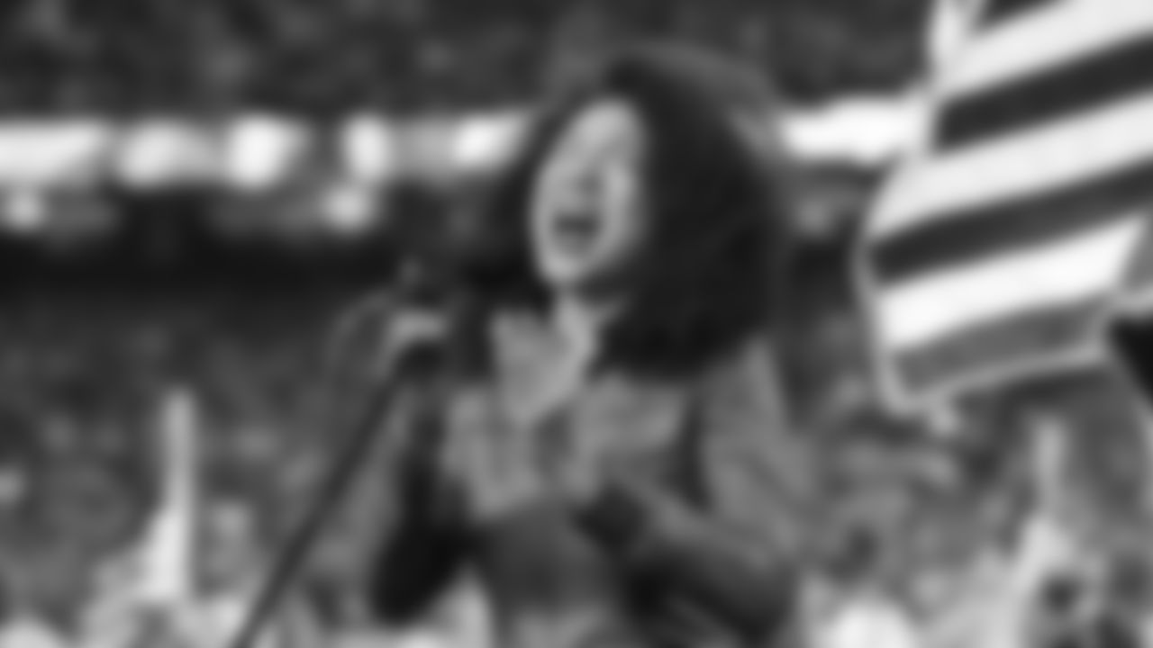 Judith Hill sings the National Anthem prior to the divisional playoff football game against the Buffalo Bills, Sunday, January 23, 2022 in Kansas City.