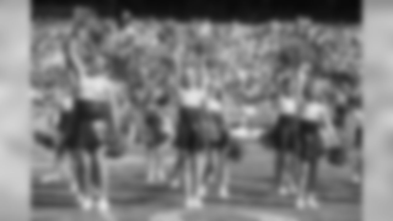 Kansas City Chiefs Cheerleaders and Junior Chiefs Cheerleaders Perform at Halftime during the Chiefs vs Rams game