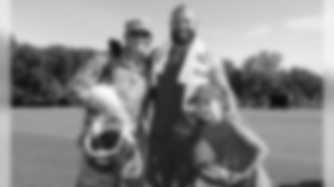 Kansas City Chiefs Fullback Anthony Sherman (42) poses with fans after a 2019 Training Camp practice at Missouri Western State University in St. Joseph, MO.