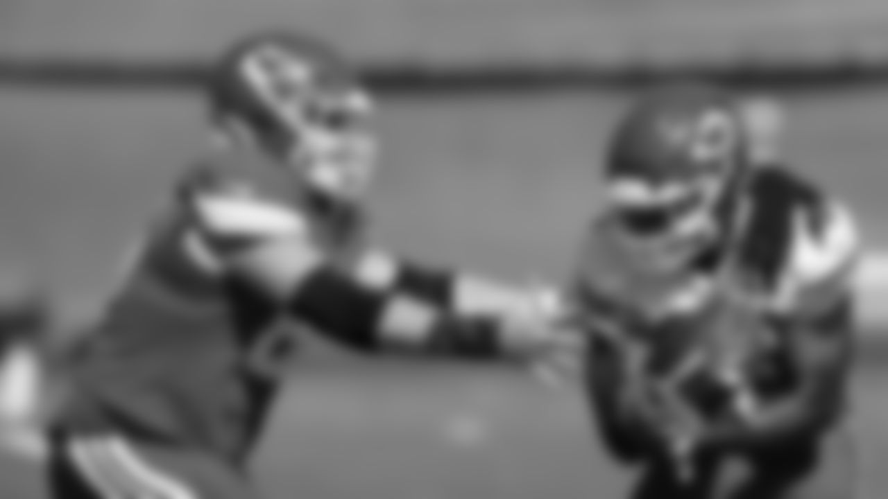 Kansas City Chiefs offensive lineman Michael Caliendo (66) and linebacker Nick Bolton (32) in action during practice on Wednesday September 28, 2022.