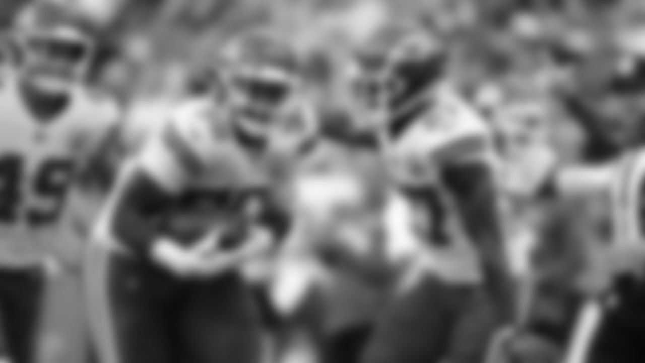 Kansas City Chiefs defensive end Tershawn Wharton (98) and defensive back Rashad Fenton (27) celebrate the interception during an NFL football game against the Washington Football Team, Sunday, October 17, 2021 at FedExField.