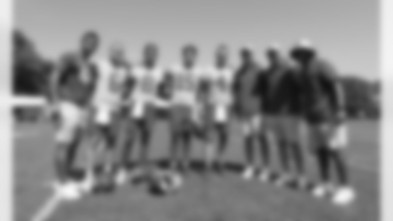 Kansas City Chiefs quarterbacks take a group photo during training camp at Missouri Western State University.