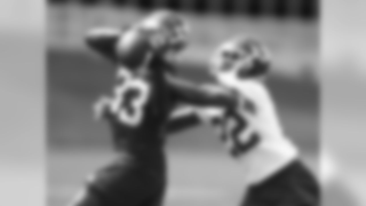 Marcus Peters making a play on the ball