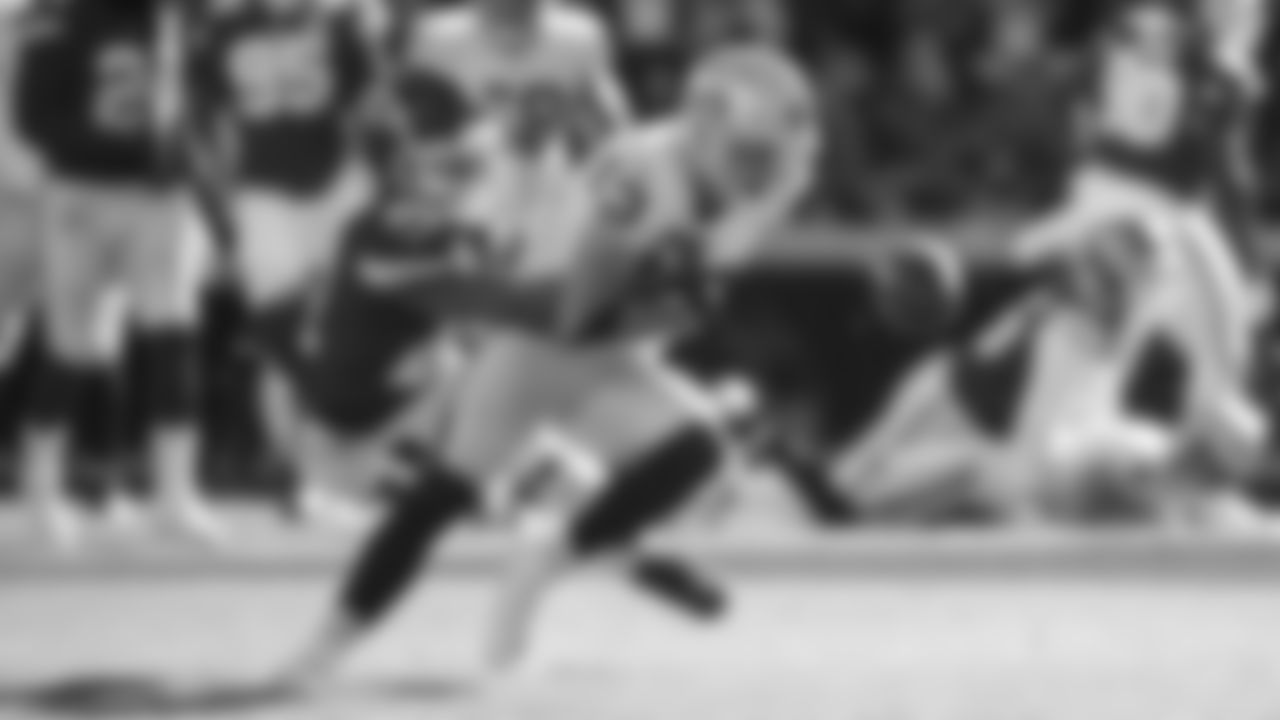 Kansas City Chiefs cornerback Mike Hughes (21) knocks the ball out during an NFL football game against the Las Vegas Raiders, Sunday, December 12, 2021 in Kansas City.