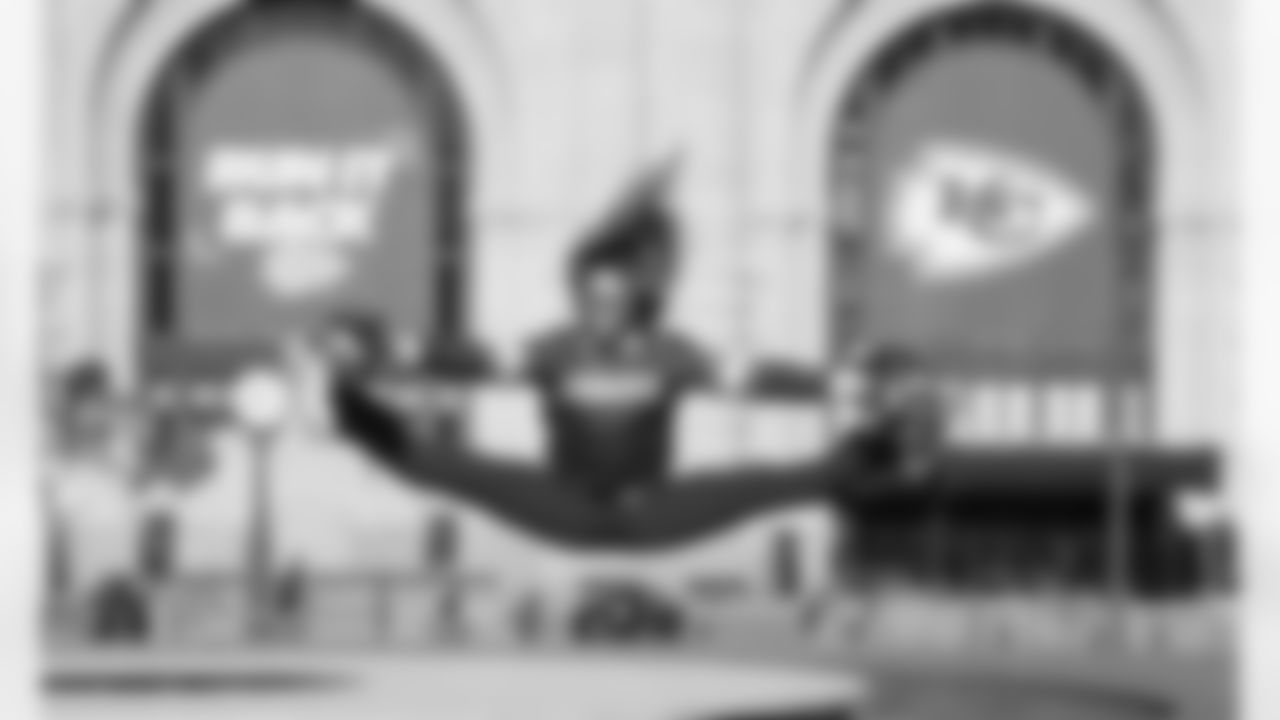 A Kansas City Chiefs Cheerleader performs in front of Union Station in Kansas City, MO
