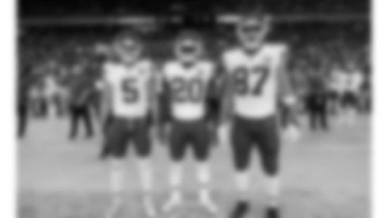 Kansas City Chiefs game captains punter Tommy Townsend (5), safety Justin Reid (20), and tight end Travis Kelce (87) before the Chiefs preseason Week 2 matchup against the Arizona Cardinals on Saturday, August 19, 2023.