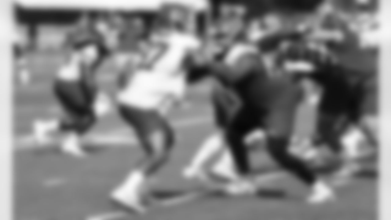 Kansas City Chiefs defensive end Alex Okafor (97) and offensive tackle Lucas Niang (67) battle during training camp at Missouri Western State University.
