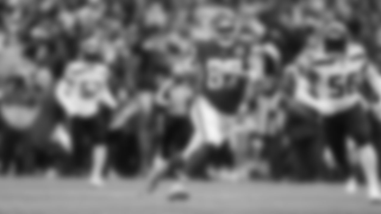 Kansas City Chiefs tight end Travis Kelce (87) runs with the ball during an NFL football game against the Seattle Seahawks, Saturday, December 24, 2022 in Kansas City.
