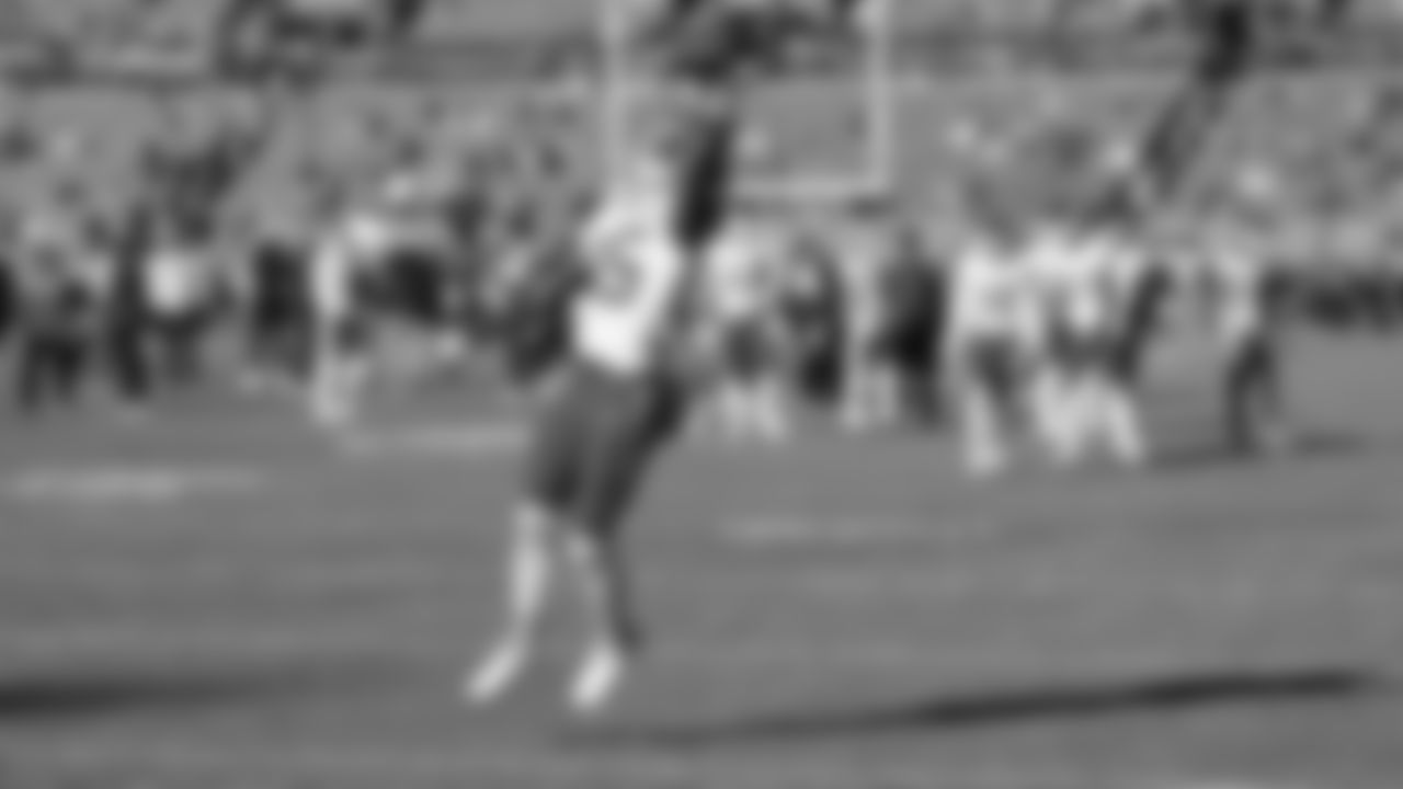 Kansas City Chiefs defensive back Jaylen Watson (35) makes a one handed catch prior to an NFL football game against the Denver Broncos, Sunday, December 11, 2022 in Denver.