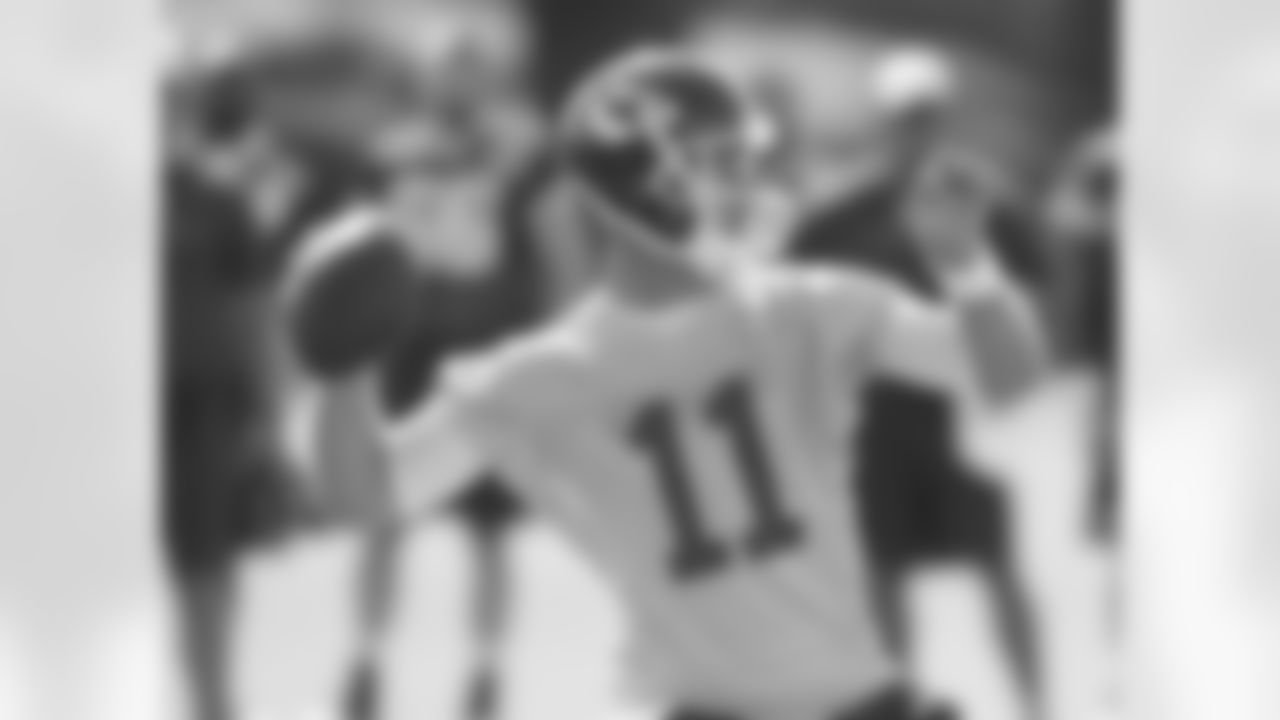 QB Alex Smith preparing to throw it deep.