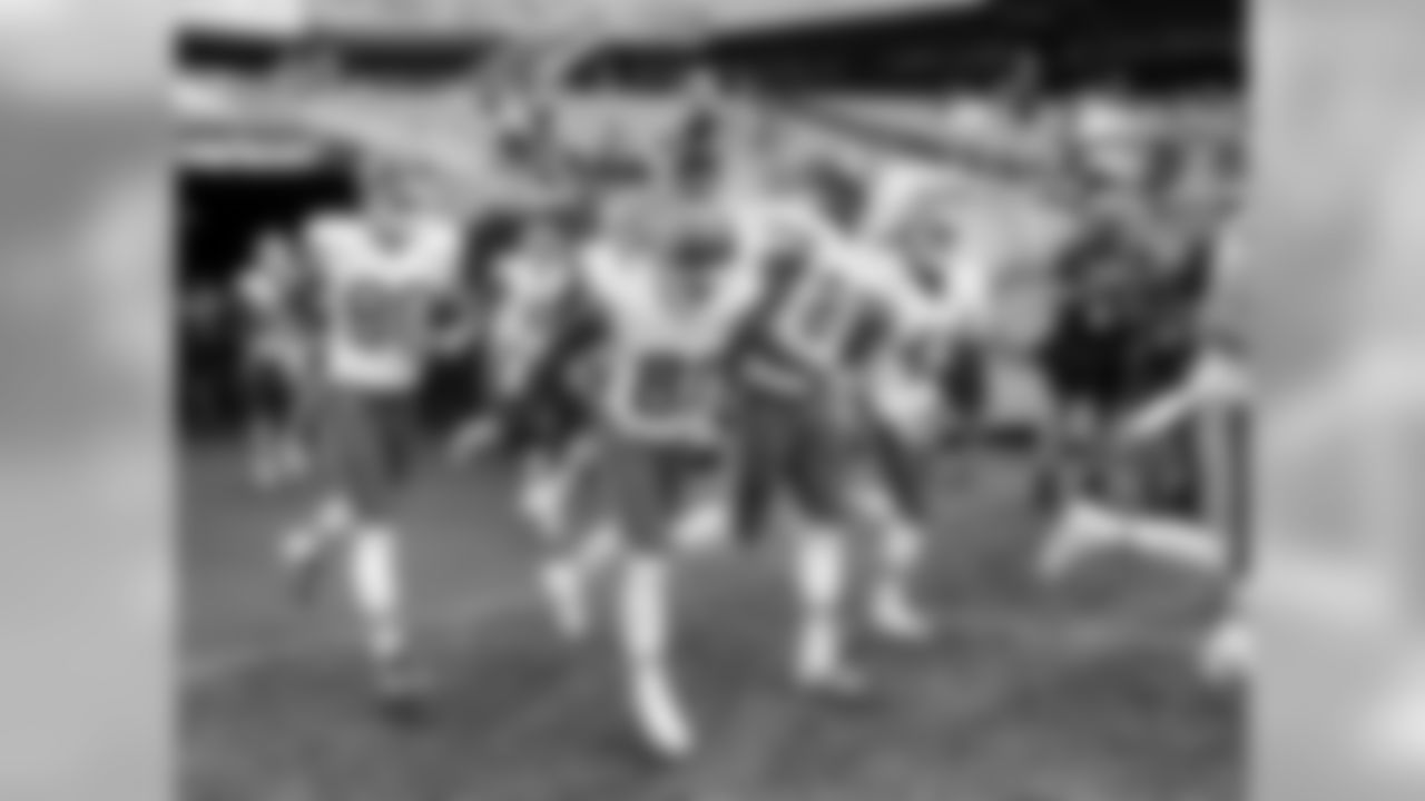 Members of the Kansas City Chiefs take the field prior to the preseason game against the Chicago Bears, Saturday, August 27, 2016, in Chicago, Illinois.
