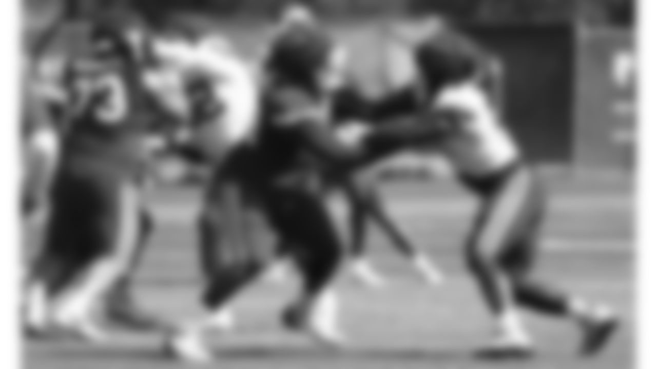 Kansas City Chiefs offensive tackle Chukwuebuka (Jason) Godrick (72) & defensive end Mike Danna (51) during in-season practice on Wednesday, September 20, 2023 in Kansas City, MO.