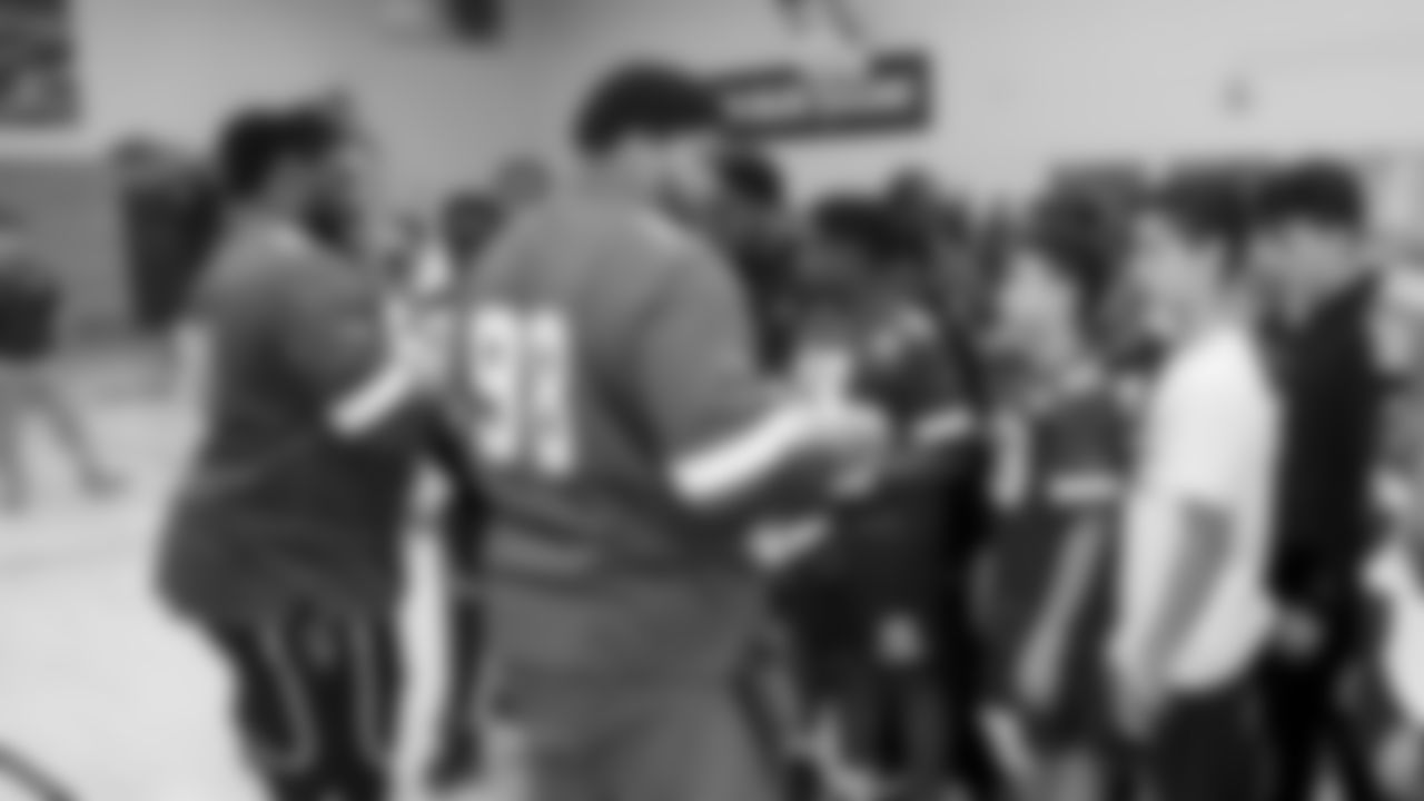 Chiefs Defensive Lineman visit the Lincoln middle school to teach football skills.