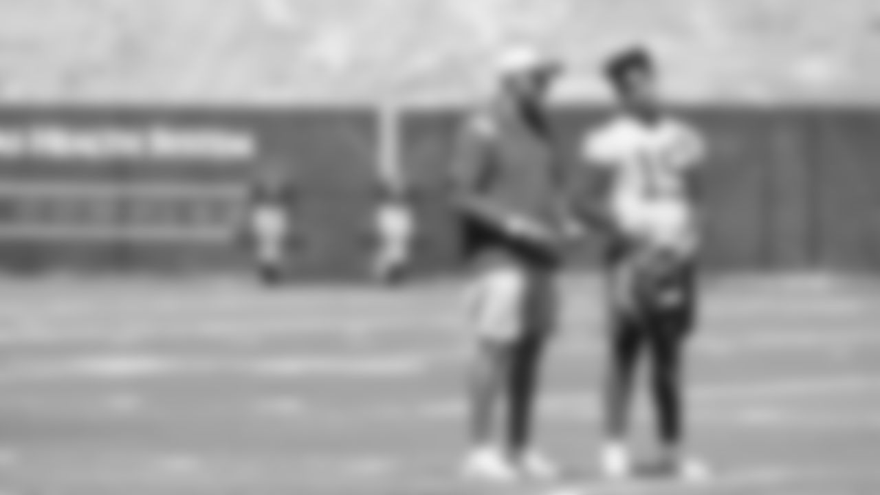 Kansas City Chiefs Quarterbacks Coach Mike Kafka and quarterback Patrick Mahomes (15) during practice at The University of Kansas Health System Training Complex.